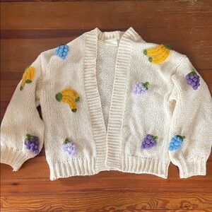 Maeve Cream Open Cardigan with Yellow Banana and Purple/Blue Fruit Appliqués